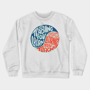 In teaching we learn and in learning we teach Crewneck Sweatshirt